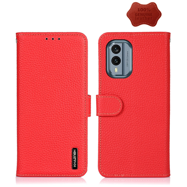 Red genuine leather litchi phone case with folio flap, camera cutout, and strap