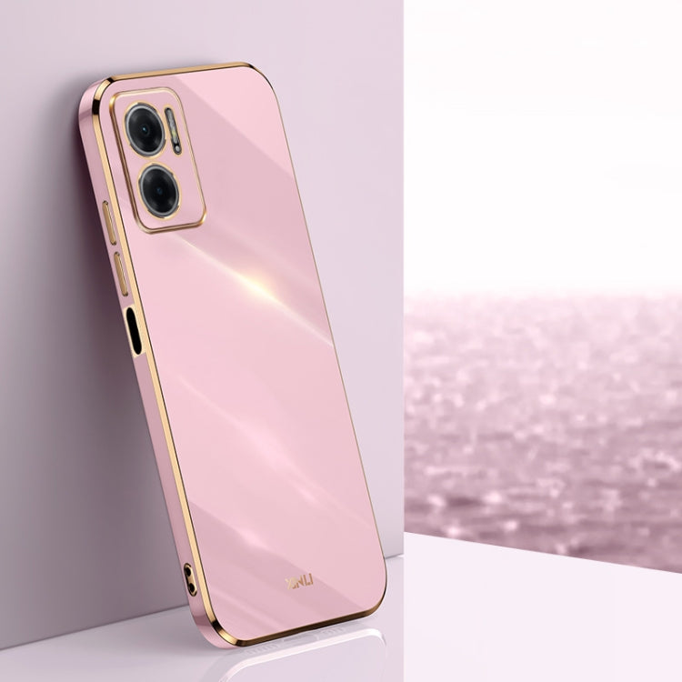 Pink electroplate TPU phone case with dual camera cutouts and gold-tone bumper