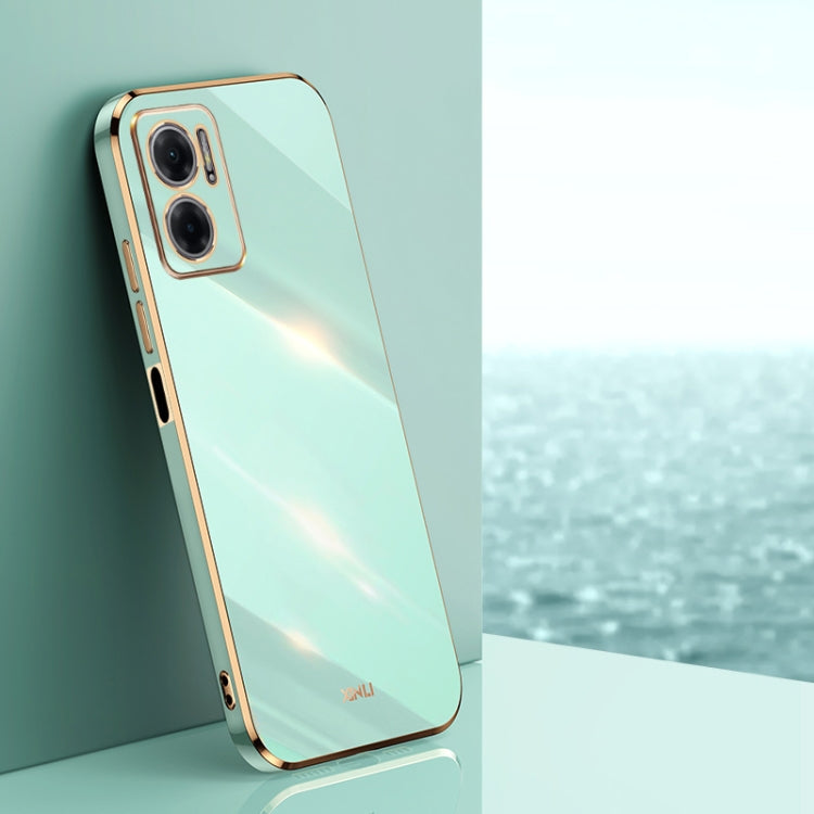 Mint green electroplate TPU phone case with dual camera cutouts and raised bezel