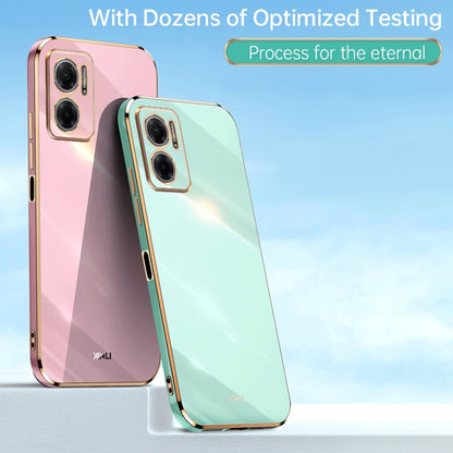 Mint blue TPU phone case with gold-tone electroplated frame and dual camera cutouts
