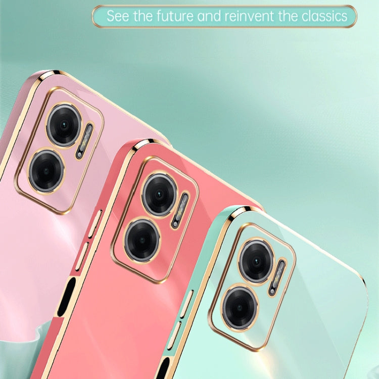Pink and mint TPU phone cases with gold-tone electroplated frames and camera cutouts