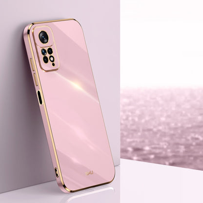 Pink electroplate TPU phone case with quad camera cutout and gold-tone bumper