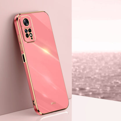 Electroplate TPU phone case, coral pink with gold trim and camera cutouts