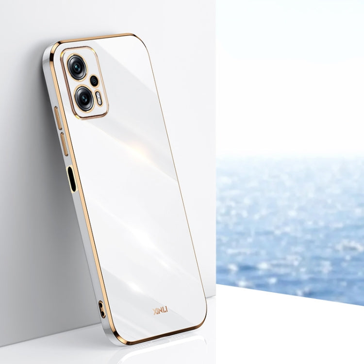 Electroplate TPU phone case, white with gold trim and camera cutouts