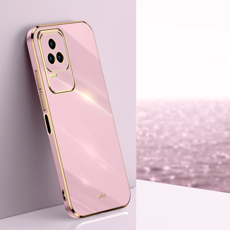 Pink TPU phone case with gold electroplated bumper, raised camera cutout.