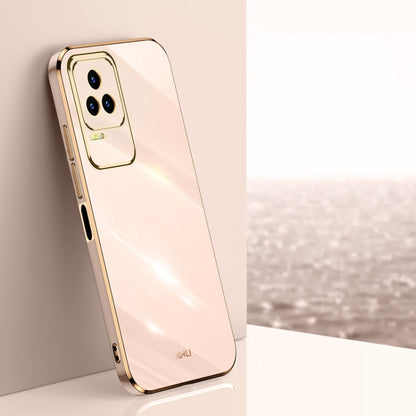 Light beige TPU phone case with gold electroplated bumper and raised camera cutout.