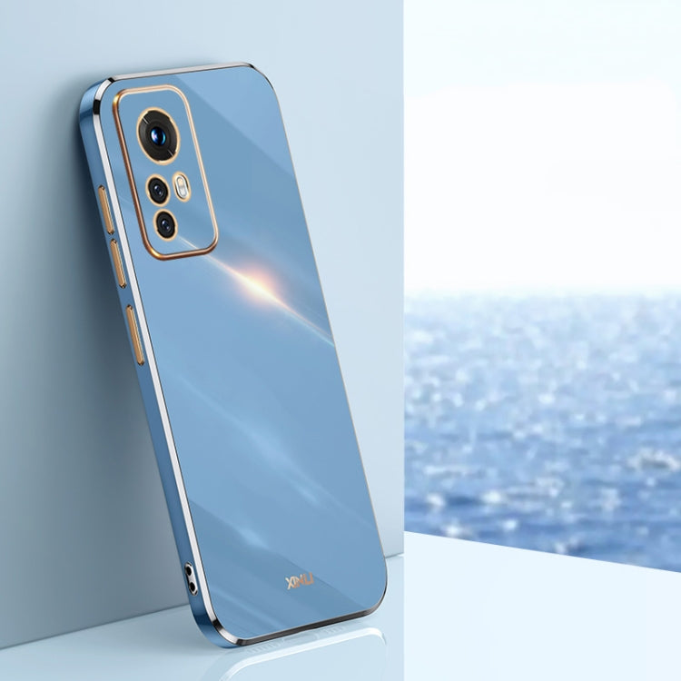 Blue electroplate TPU phone case with gold trim, raised camera bezel, and cutouts