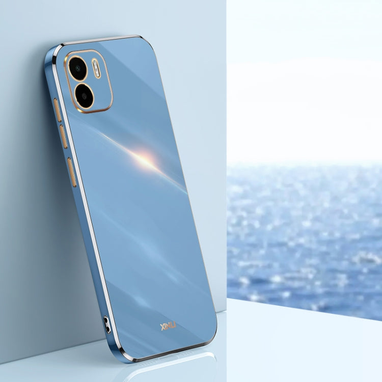 Blue TPU phone case with gold straight-edge frame and dual camera cutouts