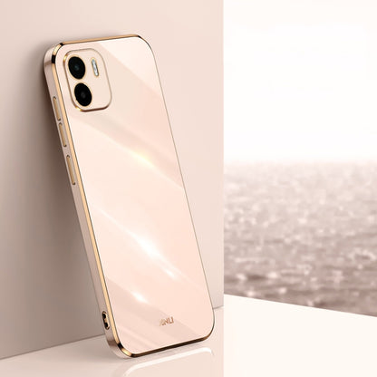 Light pink TPU phone case with gold straight-edge frame and dual camera cutouts