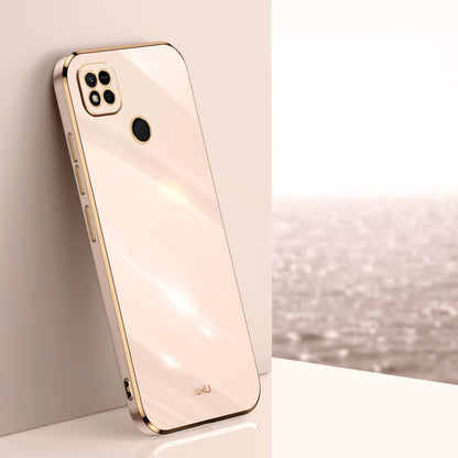 Cream TPU phone case with gold-toned edges, raised camera and screen openings