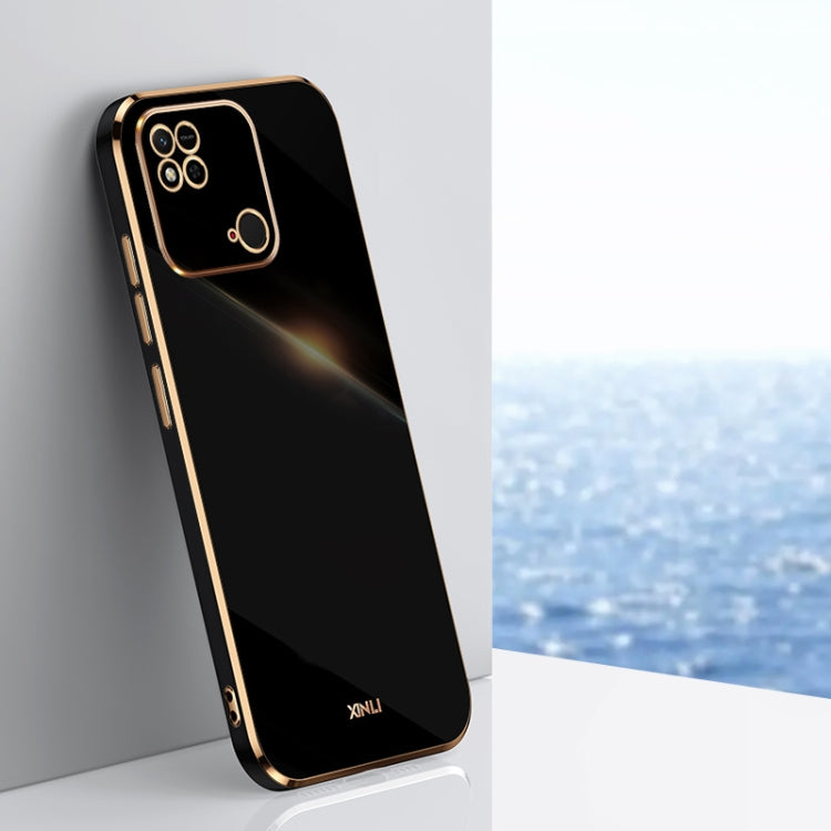 Black TPU phone case with gold-tone straight edges, camera cutouts, and raised rim
