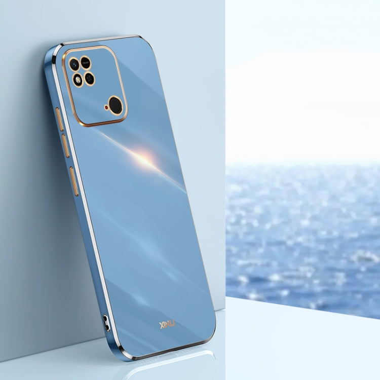 Celestial blue TPU phone case with gold-tone straight edges, camera cutouts, and rim