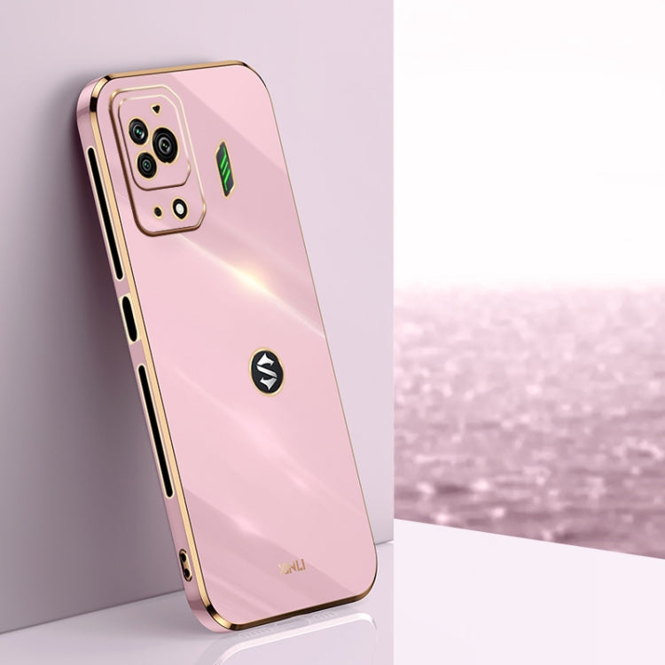 Coral pink straight-edge TPU phone case with metallic electroplated trim and camera cutouts
