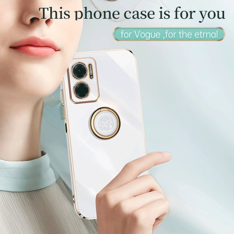 White TPU phone case with gold trim, ring holder and dual camera cutout