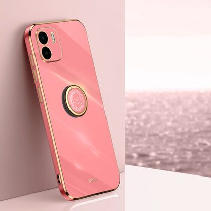 Cherry pink TPU phone case with ring holder, gold trim, and camera cutouts