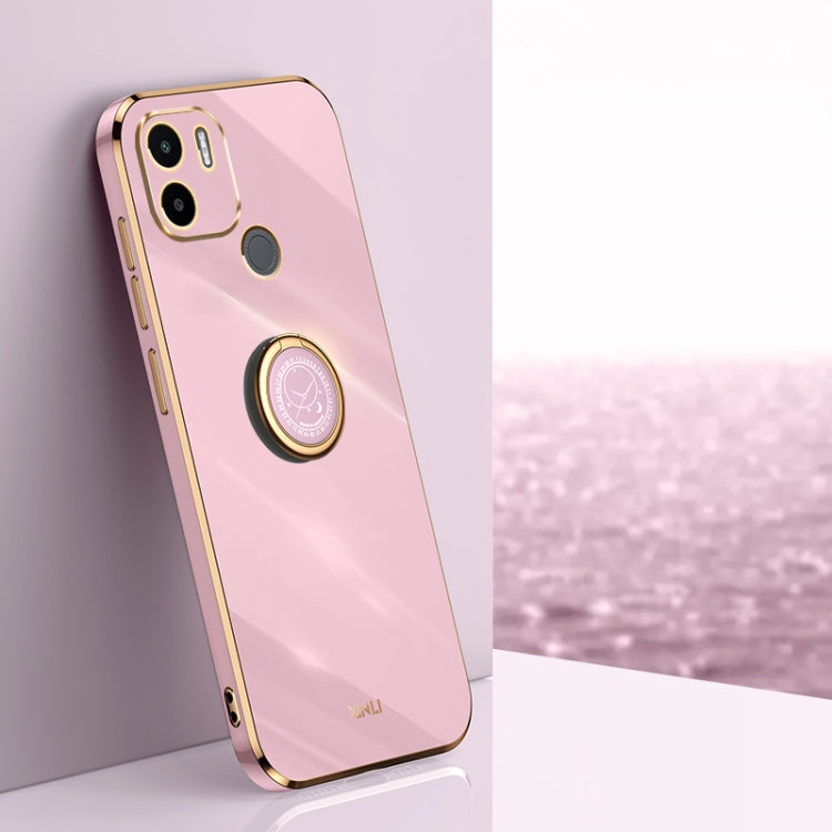 Rose pink TPU phone case with ring holder, gold trim, and camera cutouts