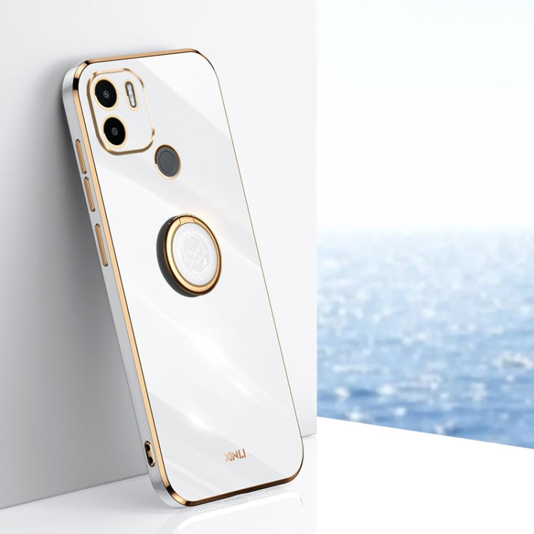 White TPU phone case with ring holder, gold trim, and camera cutouts