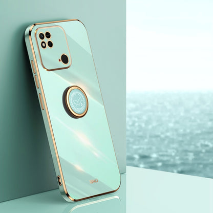 Mint green TPU phone case with electroplated edges and circular ring holder on the back