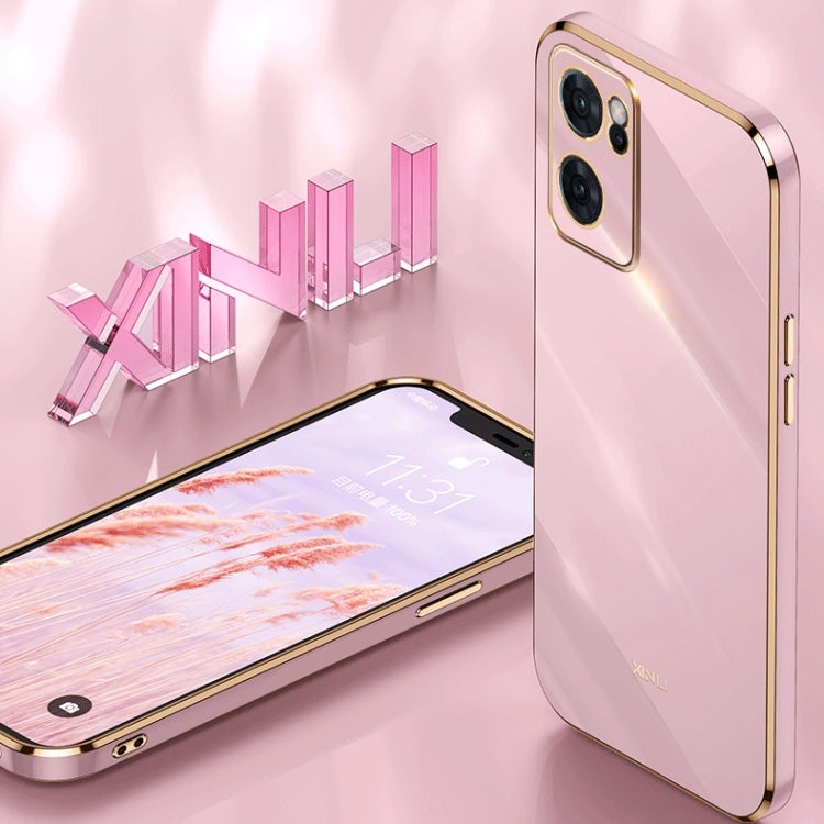 Rose pink TPU phone case with gold edge, raised dual-camera bezel