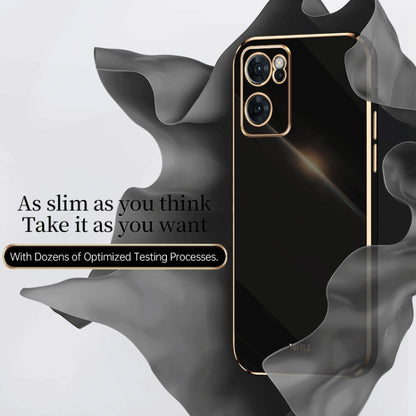 Black TPU phone case with gold trim, raised dual-camera bezel, slim profile