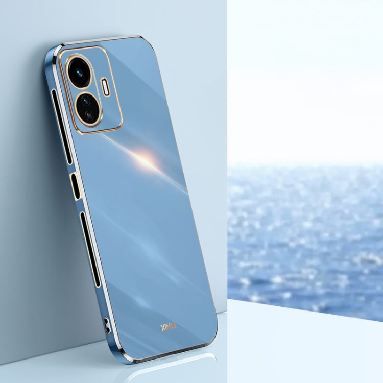 Light blue TPU phone case with gold edge, raised camera bezel, slim profile