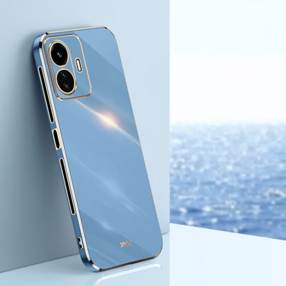 Light blue TPU phone case with gold edge, raised camera bezel, slim profile