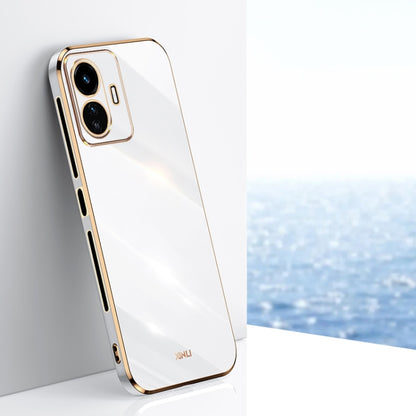 White TPU phone case with gold trim, raised dual-camera bezel, slim design