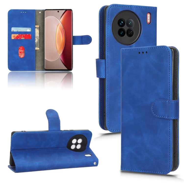 Blue leather-style flip phone case with wallet flap, card holder, and camera protection