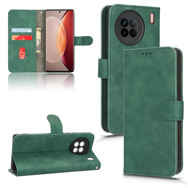 Green leather-style flip phone case with wallet flap, card slots, and rear camera openings