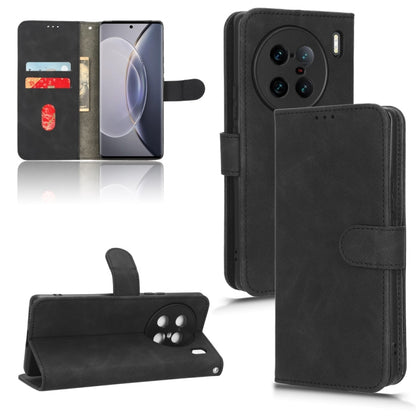 Black flip leather phone case with magnetic closure and camera cutouts on back