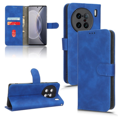 Blue leather-style magnetic flip phone case with side camera openings and card slots