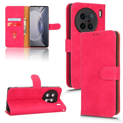 Red magnetic flip leather phone case with stitched card pocket and camera cutout