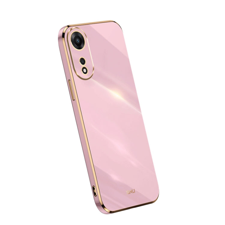 Electroplate TPU phone case in pink with gold trim; dual camera cutouts.