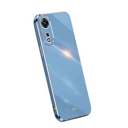 Electroplate TPU phone case in blue with gold trim; dual camera cutouts.