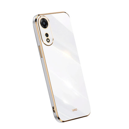 Electroplate TPU phone case in white with gold trim; dual camera cutouts.