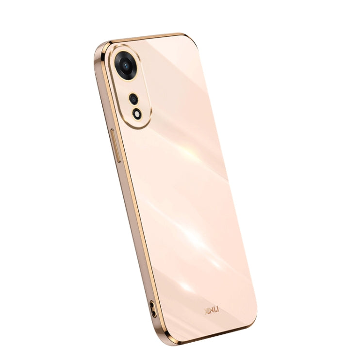 Electroplate TPU phone case in light pink with gold trim; dual camera cutouts.