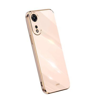Electroplate TPU phone case in light pink with gold trim; dual camera cutouts.
