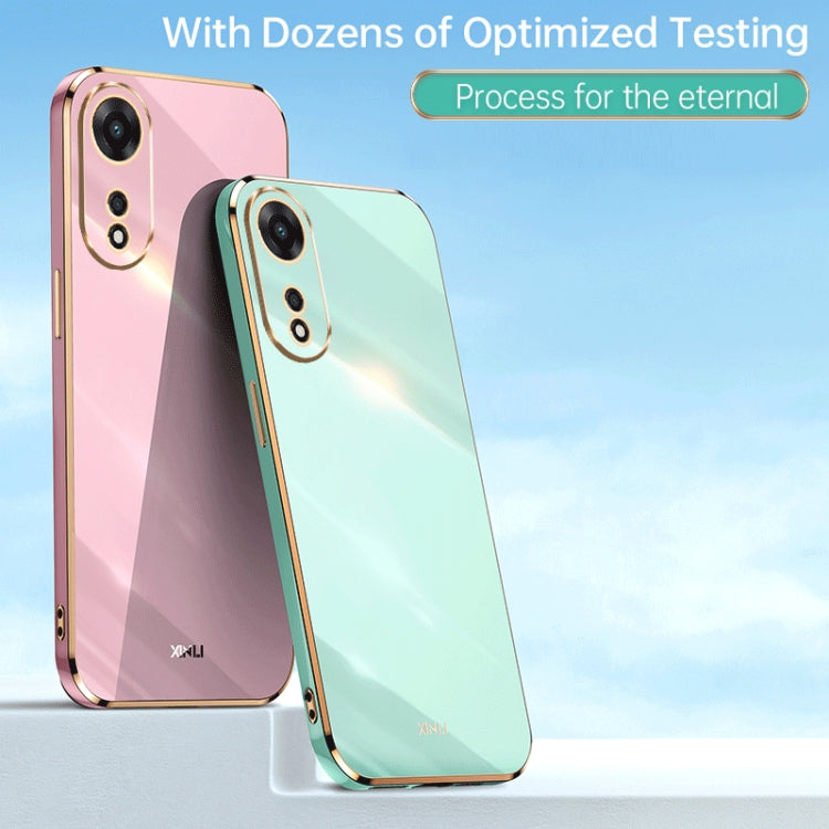 Pair of glossy TPU phone cases, pink and mint teal, electroplated edges, camera cutouts