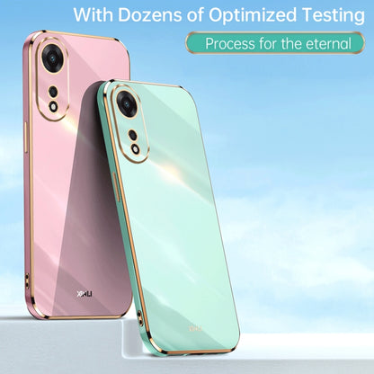 Pair of glossy TPU phone cases, pink and mint teal, electroplated edges, camera cutouts