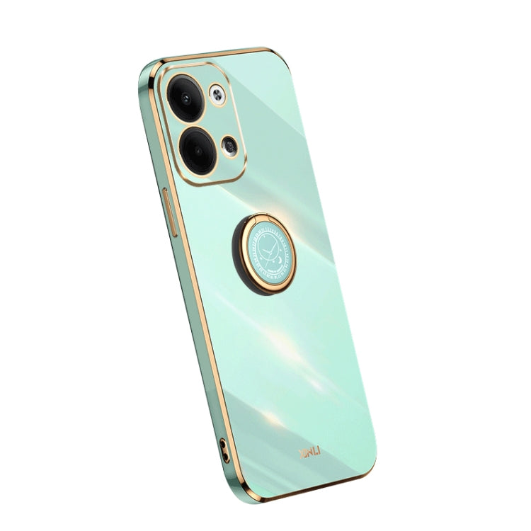 Mint green TPU phone case with ring holder and camera cutouts, electroplate trim