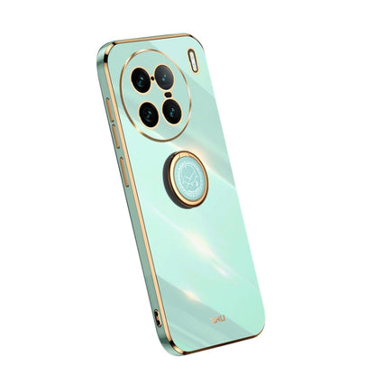 Mint green TPU phone case with ring holder and camera cutouts, electroplate trim