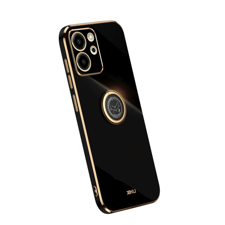 Black TPU phone case with gold ring holder and camera cutouts