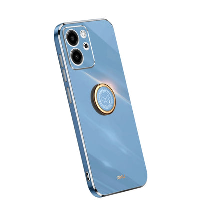 Light blue TPU phone case with gold ring holder and camera cutouts