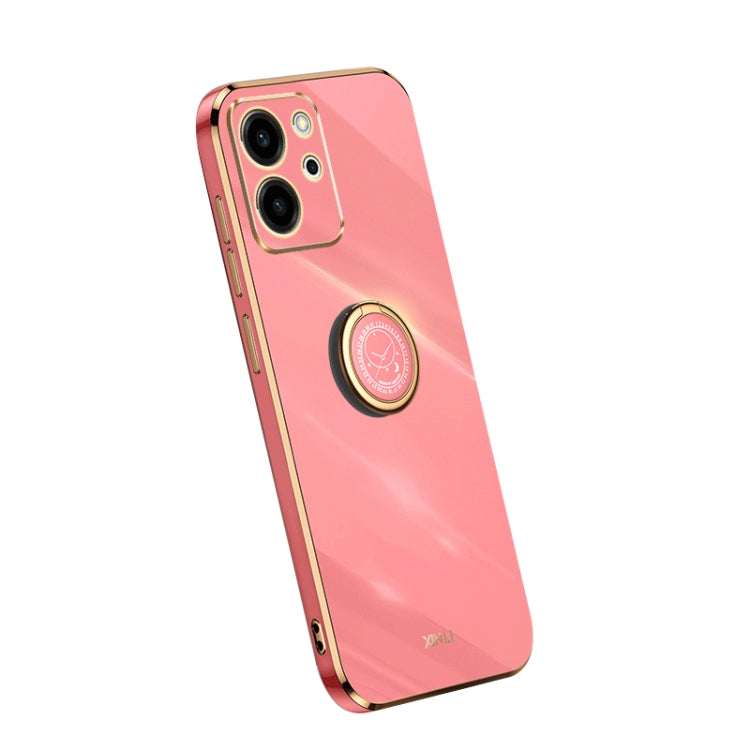 Coral pink TPU phone case with gold ring holder and camera cutouts