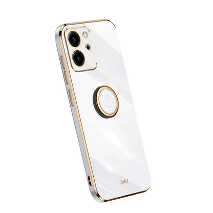 White TPU phone case with gold ring holder and camera cutouts