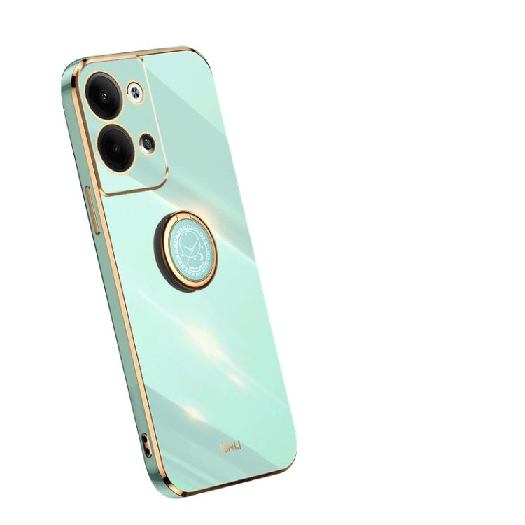 Mint green TPU phone case with ring holder and camera cutouts
