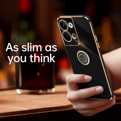 Black TPU phone case with gold ring holder, held in hand