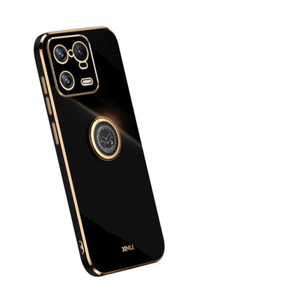 Black TPU phone case with gold ring holder and camera cutouts