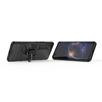Rugged black phone case with magnetic ring holder; front cover shown