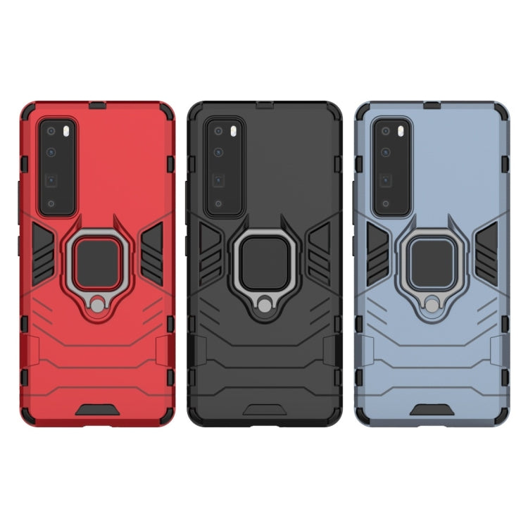Set of rugged phone cases in red, black, and blue with magnetic ring holders